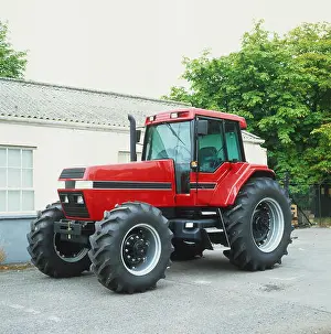A red coloured tractor