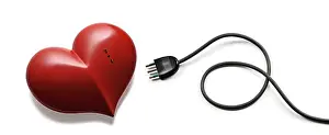 Affectionate Prints: A red heart with an electrical socket and an electrical plug next to it
