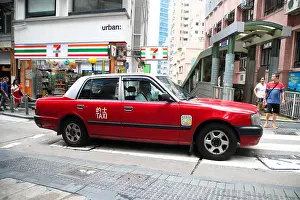 Hong Prints: Red Hong Kong taxi in Central District of Hong Kong, China, Asia