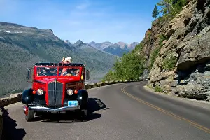 Rocky Mountains Prints: Red Jammer bus on the Going-to-the-Sun Road in Glacier National Park, Montana, USA