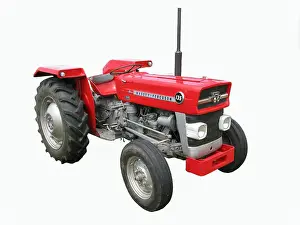 Copyright Prints: A red Massey Ferguson 135 tractor. Produced between 1964 and 1975