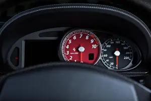 Illustrative Editorial Prints: Red speedometer in a Ferrari interior