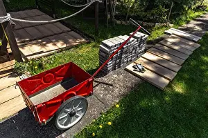 Measuring Prints: Red trolley for transporting paving stones