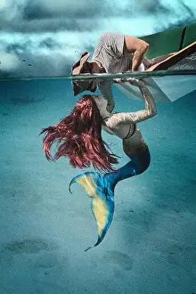 Redhead Prints: Redhead siren luring a pirate to lean into water for a kiss
