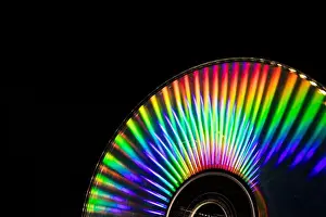 Blend Prints: Reflection of light in a Compact Disk(CD) or Digital versatile disk(DVD)