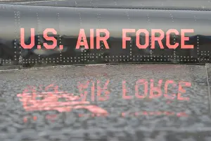 Fuselage Prints: Reflection of red lettering after a rain shower