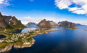 Reine Prints: Reine fishing village surrounded by high mountains and fjords on Lofoten islands