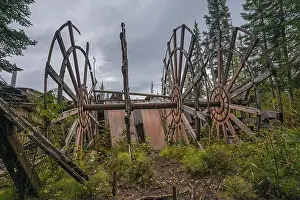 Steamboat Prints: Remains of a paddle wheel from a riverboat wreck on the banks of the Yukon River at Dawson City