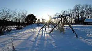 Water Sky Prints: the remains of a Sami camp on the banks of the frozen lake in northern Sweden