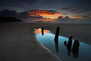 Intense Prints: The remains of the wreck of the ship Helvatia lay on Rhossili Bay in the Gower