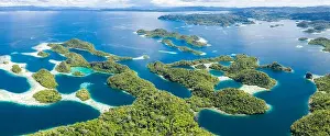 Remote limestone islands in Raja Ampat, Indonesia, are surrounded by healthy coral reefs. This region is known as the heart of the Coral Triangle