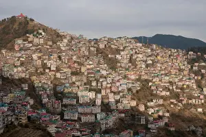 Himalayan Prints: Residential homes cover steep gradient hillside in Sanjauli in Shimla, India