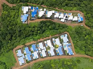 Juan Prints: Residential houses with pools in nature background aerial above top view