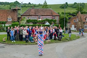 Residents of the village of Turville pose for a photograph at a Street Party to celebrate the Platinum Jubilee of Her Majesty Queen Elizabeth II