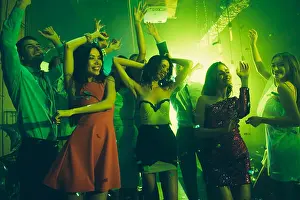 Discotheque Prints: Rest relax chill concept. People dancing in party club with neon lights