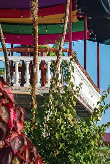 Absence Prints: Restaurant terrace architecture with fenced balcony and decorated roof