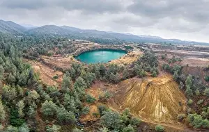 Restoration of land damaged from mining operations near Kapedes