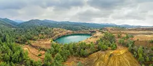 Pyrite Prints: Restoration works in copper mining area with lake in open mine pit