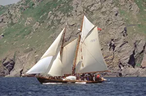 Cruising Prints: The restored 1909 British built gaff rigged schooner Hoshi under sail near Start Point Devon England Europe