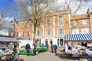 Market Square Prints: Retford Market Square with people shopping at the busy Market Stalls in Retford Nottinghamshire England UK GB Europe