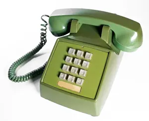 Dial Prints: Retro push button rotary dial telephone. Vintage avocado green landline phone