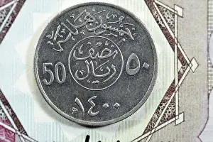 Riyal Prints: Reverse side of old Saudi Arabia fifty Halalah