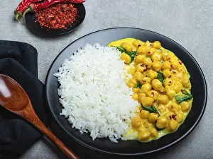 rice, chickpeas with coconut milk and curry. vegetarian dish