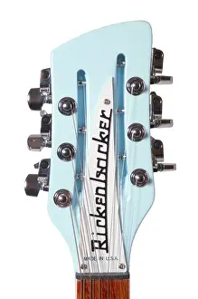Harmonious Prints: rickenbacker Electric Guitar head stock logo name cut out on white background studio cutout cut out white background