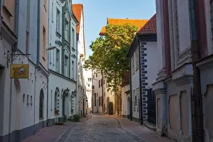 Riga Prints: RIGA, LATVIA - JULY 16, 2023: Street in old town of Riga