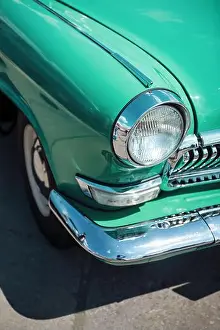 Grille Prints: Front right corner view of old turquoise 1950s car - headlight