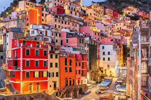 La Spezia Prints: Riomaggiore, Italy at dusk. Riomaggiore is one of the five towns of Cinque Terre