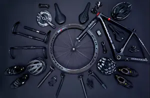 Saddle Prints: Road bike parts and accessories on a black background