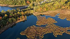 Running Prints: A road and railroad running through Matawan Creek