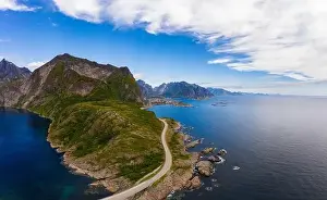 Pano Prints: Road to Reine village surrounded by high mountains and sea on Lofoten islands
