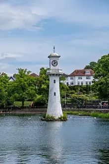 Roath Park Lighthouse Clock Tower Cardiff on a Summer Sunny Cloudy Day