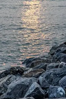 Rocks and sea : View of sea waves hitting rocks on the Calm beach in the morning. No focus, specifically
