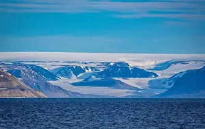 Uria Lomvi Prints: rocks waterfall small iceberg and glacier at the Alkefjellet between Spitsbergen and Nordaustlandet on Svalbard