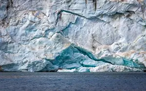 Uria Lomvi Prints: rocks waterfall small iceberg and glacier at the Alkefjellet between Spitsbergen and Nordaustlandet on Svalbard
