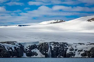 Uria Lomvi Prints: rocks waterfall small iceberg and glacier at the Alkefjellet between Spitsbergen and Nordaustlandet on Svalbard