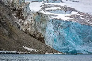 Uria Lomvi Prints: rocks waterfall small iceberg and glacier at the Alkefjellet between Spitsbergen and Nordaustlandet on Svalbard