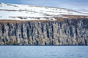 Uria Lomvi Prints: rocks waterfall small iceberg and glacier at the Alkefjellet between Spitsbergen and Nordaustlandet on Svalbard