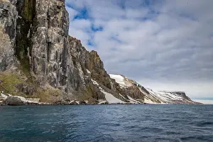 Uria Lomvi Prints: rocks waterfall small icebergs at the Alkefjellet between Spitsbergen and Nordaustlandet on Svalbard