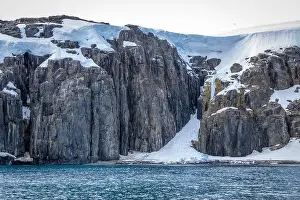 Uria Lomvi Prints: rocks waterfall small icebergs at the Alkefjellet between Spitsbergen and Nordaustlandet on Svalbard