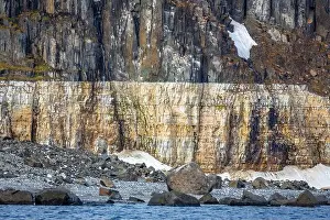 Uria Lomvi Prints: rocks waterfall small icebergs at the Alkefjellet between Spitsbergen and Nordaustlandet on Svalbard