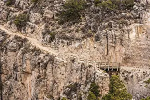 Stark Prints: Rocky Trail Leading To Wooden Bridge On Cliffside on the Guadalupe Peak Trail
