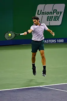Rolex Prints: Roger Federer of Switzerland returns a shot to Rafael Nadal of Spain in their final of men's singles during