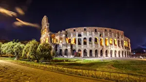 Colosseum Prints: Roman Colosseum (Coliseum) at night, one of the main travel attractions in Rome. Italy