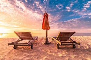 Images Dated 11th December 2015: Romantic beach scene, two sun chairs and sunny beach mood. Exotic travel destination