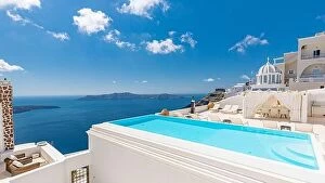 Images Dated 11th May 2019: Romantic holidays Santorini resorts with infinity pool and sea view. Amazing summer travel landscape