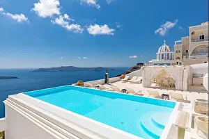 Romantic holidays Santorini resorts with infinity pool and sea view. Amazing summer travel landscape and white architecture, honeymoon destination
